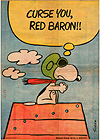 Charles Schultz panel of Snoopy with a thought bubble above saying 'CURSE YOU, RED BARON!!' 